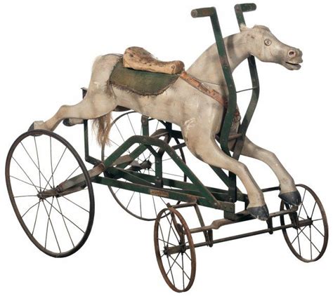 wooden horse mounted on a metal rolling chassis|Wood Horse Wheels Vintage for sale .